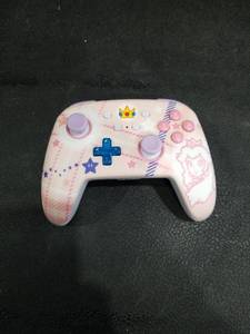 lot 4758 image: PowerA Nintendo Switch Princess Peach Wireless Controller