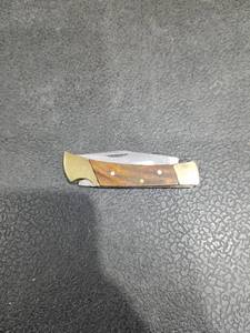 lot 4809 image: Folding Pocket Knife with Wood Handle and Brass Bolsters