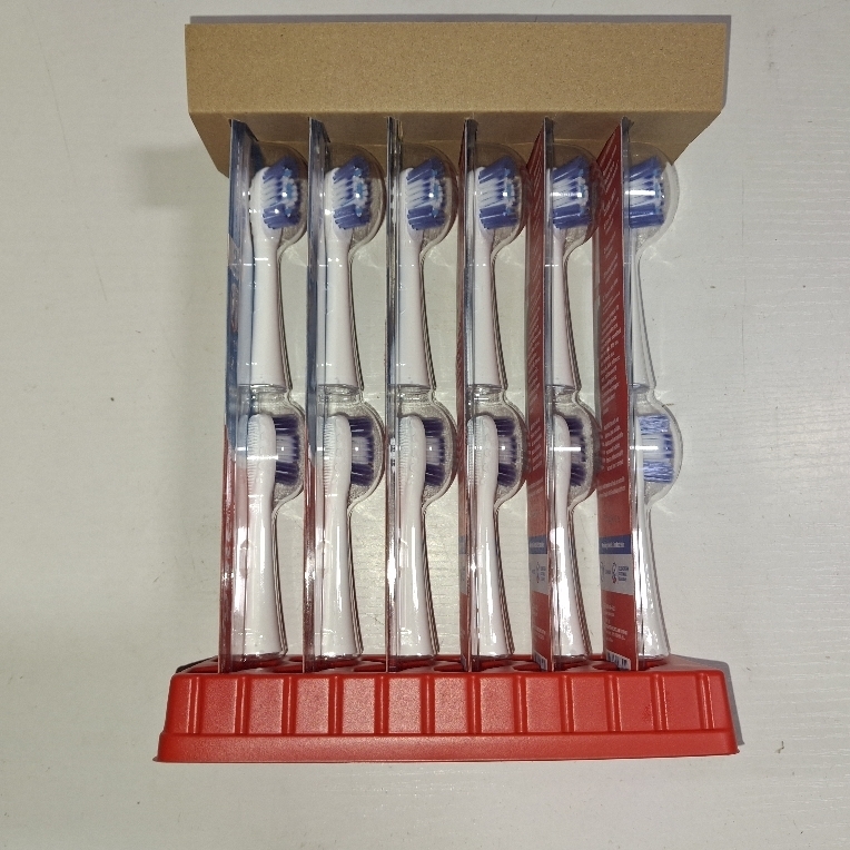 lot 213 image: Colgate 360 Floss Tip, Sonic Powered Battery Adult Toothbrush, Refill Pack, 12ct