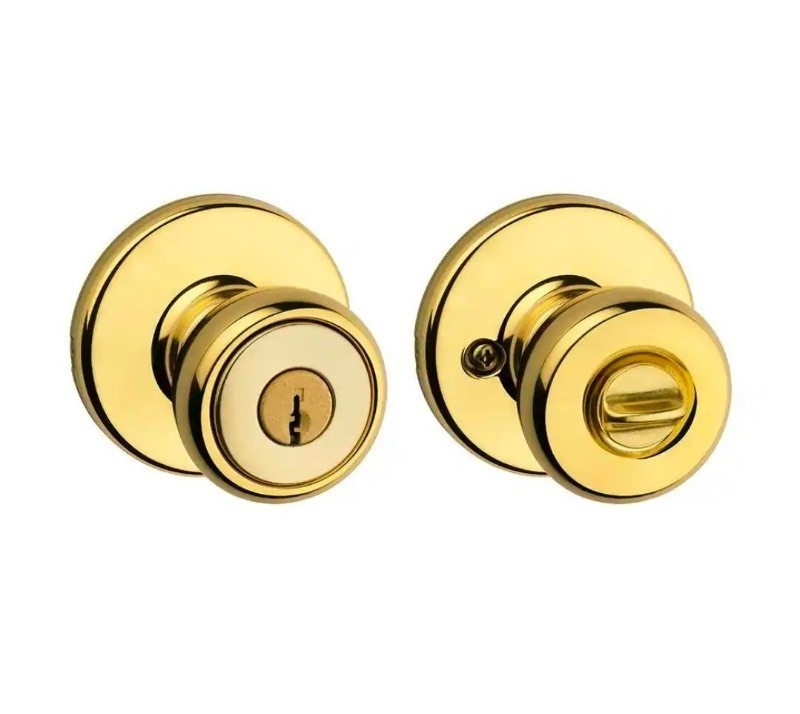 lot 3565058 image: KwiksetTylo Polished Brass Keyed Entry Door Knob Featuring Microban Antimicrobial Technology - Retail $13