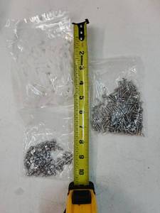 lot 45887 image: PLASTIC Wall Anchors and Two Types of Screws, COUNT UNKNOWN. - Retail $0