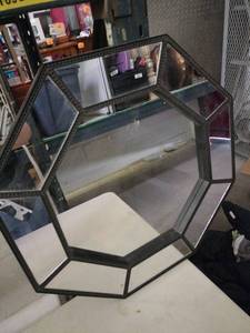 lot 25303 image: octagonal wall mirror with a dark segmented frame