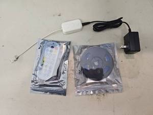 lot 25380 image: Roll of LED Multicolor Ceiling Strip Lights