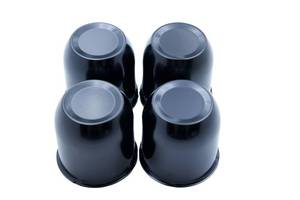 lot 1134 image: A 4 Push Through Black Wheel Center Caps for Trailer Wheel Rims 3.25 Center Bore