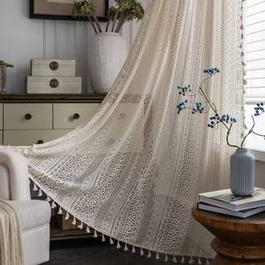lot 14197 image: Sutuo Home Boho Curtain Crochet Lace Semi-Sheer Bohemian Hollow Knitted Handmade Tassels, Rod Pocket Window Treatment Vintage Rustic Farmhouse Drapes for Bedroom, 1 Panel 59 W x 96 L, Beige