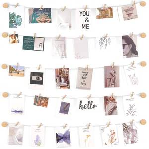 lot 20421 image: Mkono Hanging Photo Display Pictures Wall Decor 5 Rope Strings with 30 Clips Multi Pictures Cards Holder Teen Girl Room Wall Art for Bedroom, Nursery, Dorm Room, Birthday Christmas Gift, Ivory