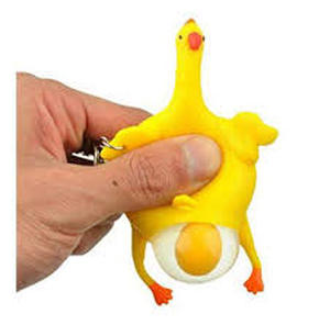 lot 16230 image: Yellow Rubber Chicken Egg Laying Gag Toy