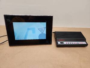 lot 17 image: Insignia Digital Picture Frame with USRobotics Courier Lite 56K Business Modem