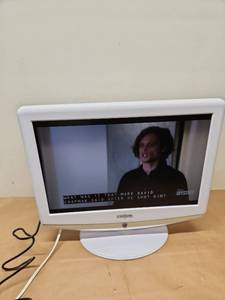 lot 25 image: Insignia White LCD TV with Stand