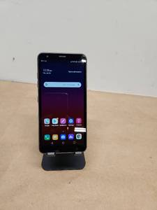 lot 53 image: LG Android Smartphone with Charging Cable