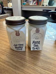 lot 4129 image: Two Whiskey Boat 16 ounce candles