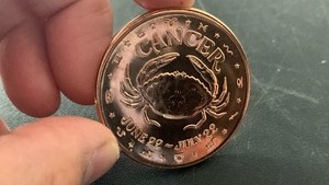 lot 55 image: 1 oz 999 Fine Copper Round Cancer The Zodiac Signs design
