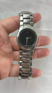 lot 19 image: Movado Swiss Quartz Stainless Steel Watch with Black Dial
