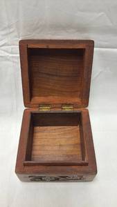 lot 25 image: Hand Carved Wooden Jewelry Box with Brass Hinges