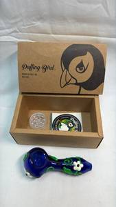 lot 29 image: Puffing Bird Glass Pipe with Grinder and Accessories