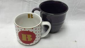 lot 129 image: Set of Two Ceramic Coffee Mugs Black and Polka Dot Pattern