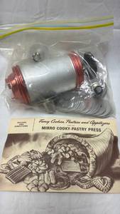 lot 131 image: Mirro Cookie Press with Recipe Book and Discs