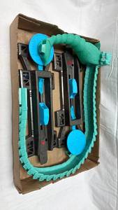 lot 192 image: 2 Hot Wheels Track Builder System Launchers (Part DLF28) & the loop tail of the giant toxic scorpion from the Hot Wheels City Toxic Scorpion Attack Playset