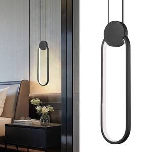 lot 49055 image: Modern Black LED Pendant Lights Fixtures, 2 Pack Minimalist Design Oval Pendant Lighting for Kitchen Island,Warm White Hanging Light for Bedroom Dining Room Bathroom 8W - Retail $70