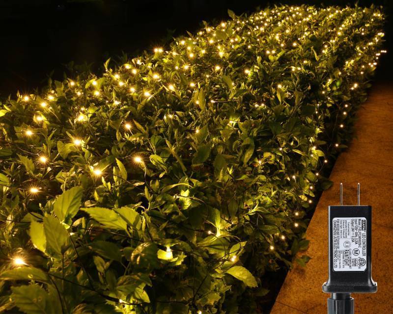 lot 26882 image: 4ft x 6ft Christmas Net Mesh lights, 8 Modes Timer Connectable Waterproof Christmas Lights for Trees, Bushes, Wedding, Garden, Outdoor Decorations (Warm White, 1PACK) - Retail $15