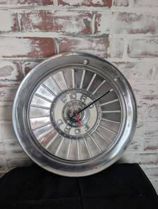 lot 150 image: Ford Hubcap Wall Clock - 14 in