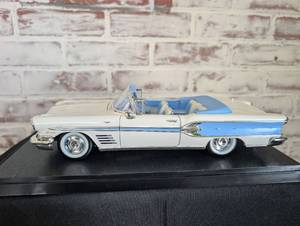 lot 200 image: Pontiac Bonneville Convertible Die-Cast Model Car in Display Case