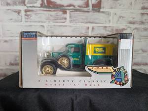 lot 650 image: Liberty Classics Ford Model A Pickup Green Thumb Die-Cast Metal Bank