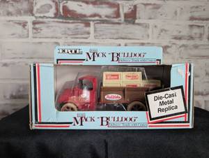 lot 711 image: ERTL 1926 Mack Bulldog Delivery Truck Die-Cast Metal Bank