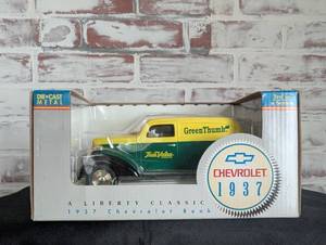 lot 714 image: Liberty Classics 1937 Chevrolet Panel Van Die-Cast Metal Bank Green Thumb True Value