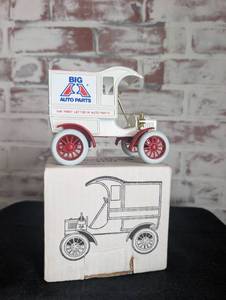 lot 718 image: ERTL 1905 Delivery Car Coin Bank Big A Auto Parts
