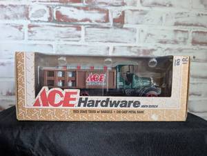 lot 1106 image: Ertl Collectibles ACE Hardware 1925 Kenworth Stake Truck with Barrels Die-Cast Metal Bank