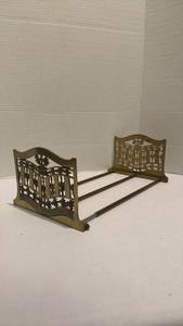 lot 1518 image: Vintage brass slide bar bookend