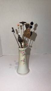 lot 1530 image: Vintage hat pins with holder