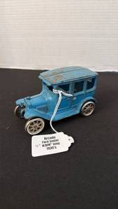 lot 1005 image: Arcade 1930s Ford sedan