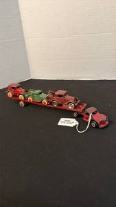 lot 1019 image: Arcade car truck and trailer set with 3 Austins