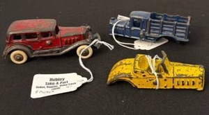 lot 1048 image: Hubley take-a-part sedan, roadster and stake truck