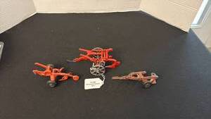 lot 1060 image: Arcade McCormick Deering and other plows