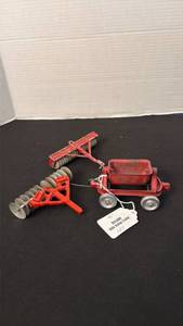 lot 1063 image: Arcade side dump trailer and more