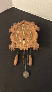 lot 1082 image: Cuckoo Clock with Carved Wood Case approximately 8 in