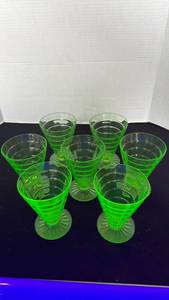 lot 1135 image: Block optic uranium glass footed tumblers  (7)