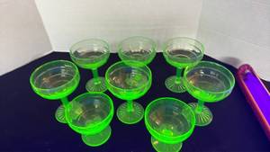 lot 1141 image: Block optic uranium glass champagne glasses (8)