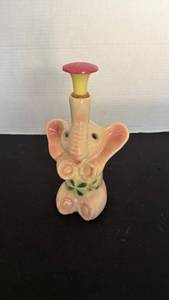 lot 1205 image: Vintage ceramic elephant laundry sprinkler bottle