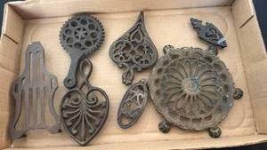 lot 1212 image: Vintage iron trivets