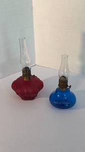 lot 1313 image: Vintage cranberry and cobalt glass miniature oil lamps