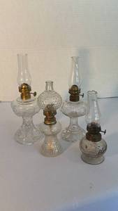 lot 1314 image: Vintage clear glass miniature oil lamps