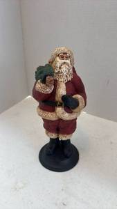 lot 1603 image: Pecan shell wood world Santa figurine 11 inches tall