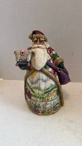 lot 1613 image: Jim Shore ore the fields we go Santa Figurine with Quilted Design 10 inches tall
