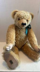 lot 1636 image: Merrythought Golden Mohair Teddy Bear with Ribbons