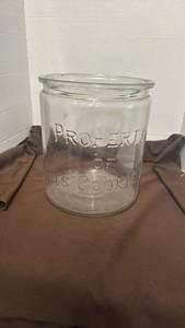 lot 1714 image: Vintage embossed glass store display jar, Property of Dads Cookie Co. advertising jar
