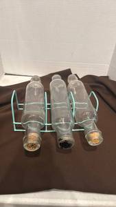 lot 1719 image: Vintage glass rolling pins with rack